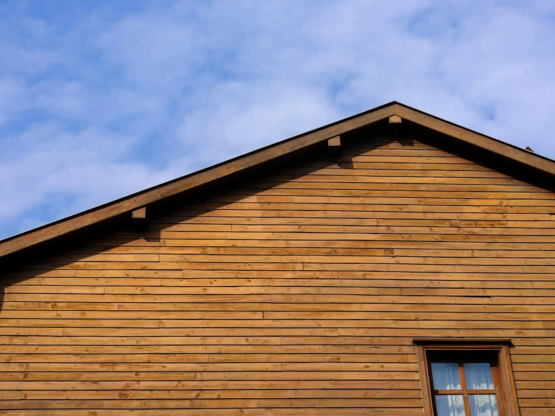 Modern home exterior with premium siding in a mountain setting